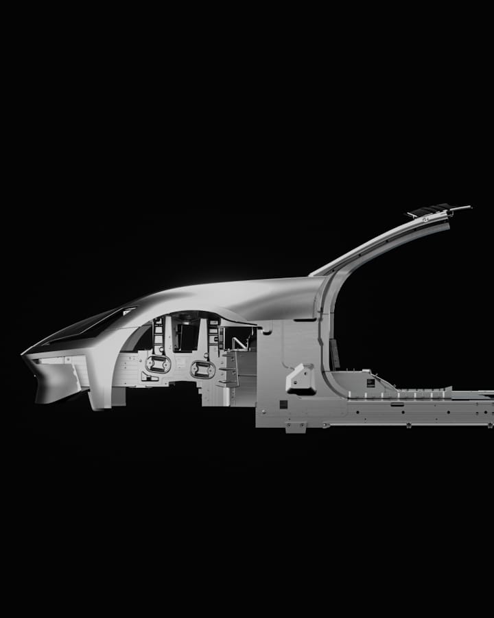 Polestar 6 frame in a dull chrome colour floating in a completely black background.